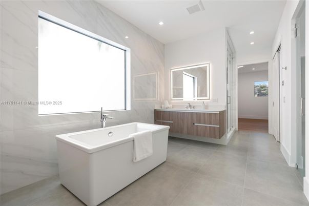 Bathroom, Dual Sink Vanities, Free Standing Baths, Interior, Marble Walls, Recessed Lighting