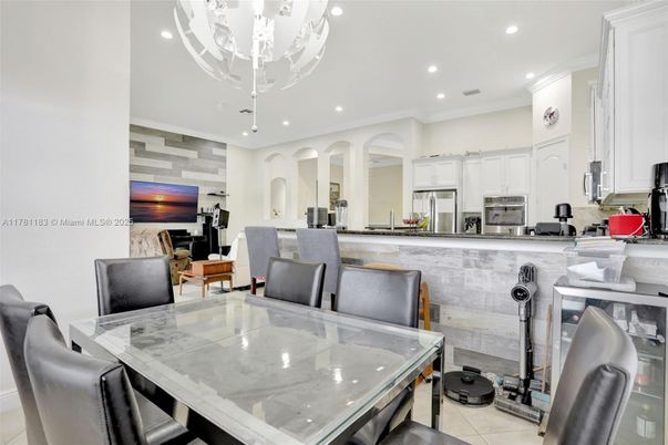 Chandelier, Dining room, Interior, Kitchen, Recessed Lighting, Stainless Steel Appliances