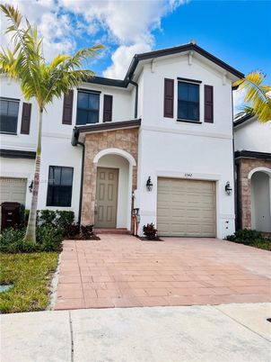 Attached, Exterior, Facade, Spanish Mediterranean