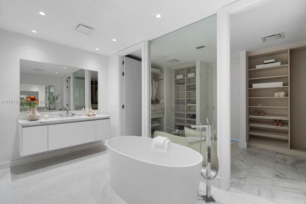 Bathroom, Dual Sink Vanities, Free Standing Baths, Glass Shower, Interior, Marble, Recessed Lighting, Walk-in Closets