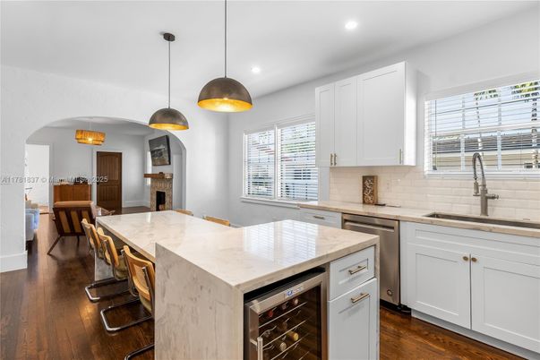 Fireplace, Interior, Kitchen, Pendant Lights, Recessed Lighting, Stainless Steel Appliances, Wood Texture Flooring