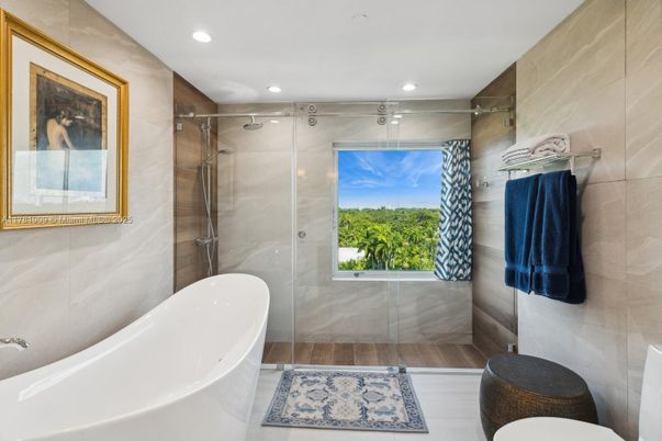 Bathroom, Free Standing Baths, Glass Shower, Interior, Recessed Lighting, Wood Texture Flooring