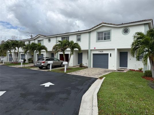 Attached, Exterior, Facade, Spanish Mediterranean