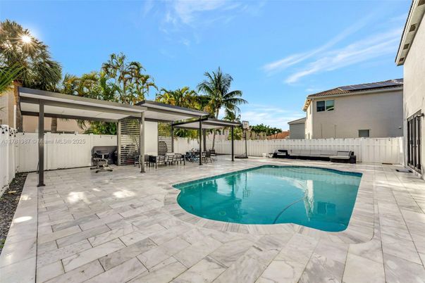 Exterior, Pool, Solar Panels