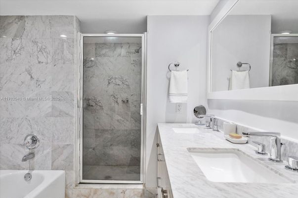 Bathroom, Dual Sink Vanities, Glass Shower, Interior, Marble Walls