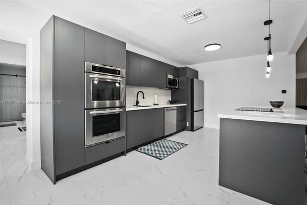 Interior, Kitchen, Marble, Pendant Lights, Stainless Steel Appliances