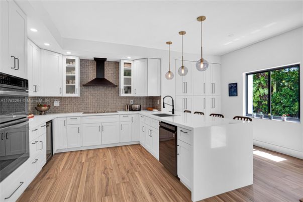 Interior, Kitchen, Pendant Lights, Recessed Lighting, Stainless Steel Appliances, Wood Texture Flooring