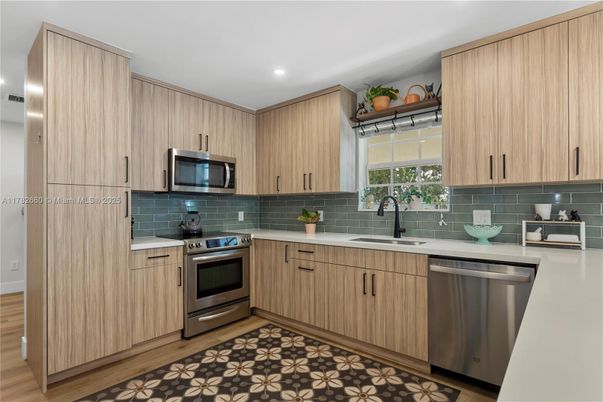 Interior, Kitchen, Recessed Lighting, Stainless Steel Appliances, Wood Texture Flooring