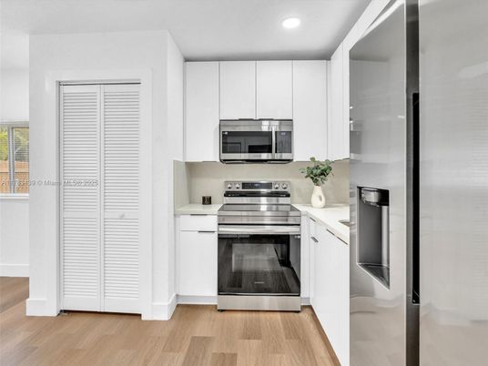 Interior, Kitchen, Recessed Lighting, Stainless Steel Appliances, Wood Texture Flooring