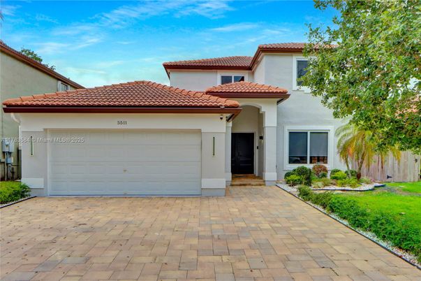 Attached, Exterior, Facade, Mediterranean