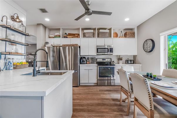 Interior, Kitchen, Recessed Lighting, Stainless Steel Appliances, Wood Texture Flooring