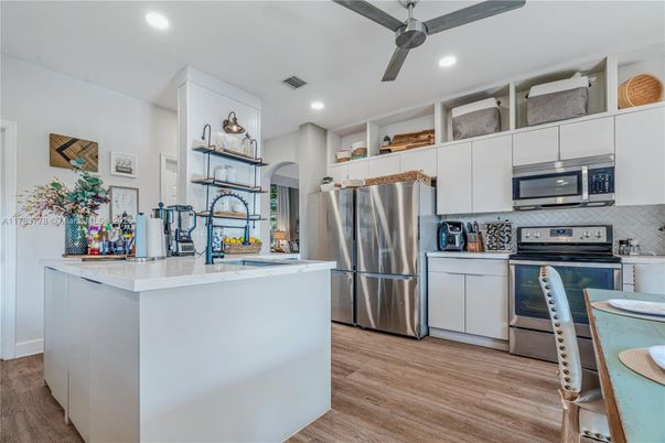 Interior, Kitchen, Recessed Lighting, Stainless Steel Appliances, Wood Texture Flooring