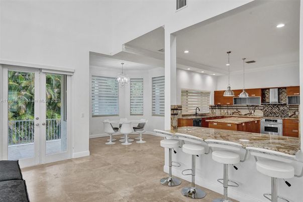 Chandelier, Dining room, Interior, Kitchen, Pendant Lights, Recessed Lighting, Stainless Steel Appliances