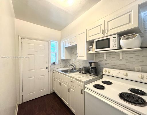 Interior, Kitchen, Tile Countertops, Wood Texture Flooring
