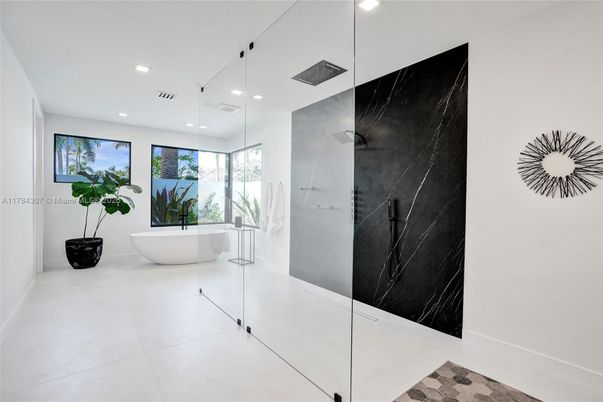 Bathroom, Free Standing Baths, Glass Shower, Interior, Marble Walls, Recessed Lighting
