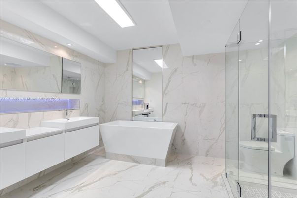 Bathroom, Dual Sink Vanities, Free Standing Baths, Glass Shower, Interior, Marble, Marble Walls, Recessed Lighting