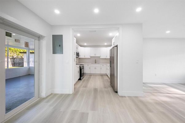 Interior, Kitchen, Recessed Lighting, Stainless Steel Appliances, Wood Texture Flooring