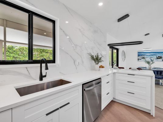 Interior, Kitchen, Marble Walls, Pendant Lights, Recessed Lighting, Stainless Steel Appliances, Wood Texture Flooring