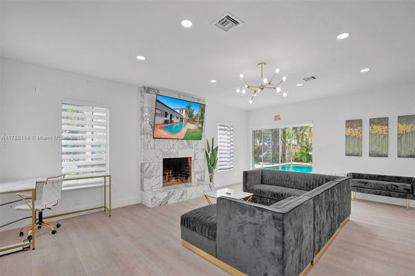 Fireplace, Home Office, Interior, Living room, Pendant Lights, Recessed Lighting, Wood Texture Flooring
