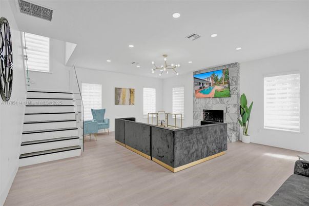 Fireplace, Interior, Pendant Lights, Recessed Lighting, Wood Texture Flooring