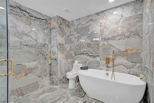 Bathroom, Free Standing Baths, Glass Shower, Interior, Marble, Marble Walls, Recessed Lighting