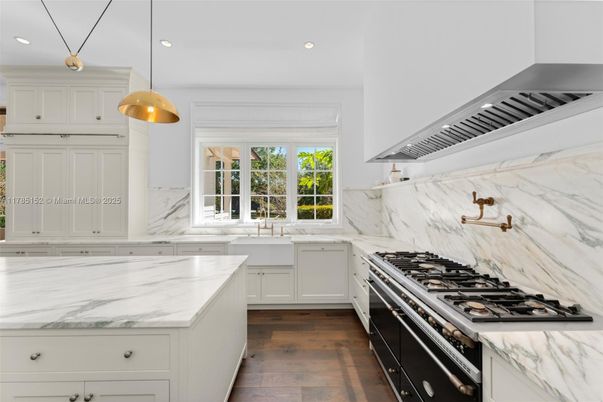 Interior, Kitchen, Marble Walls, Pendant Lights, Recessed Lighting, Stainless Steel Appliances, Wood Texture Flooring