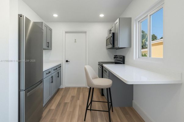 Interior, Kitchen, Recessed Lighting, Stainless Steel Appliances, Wood Texture Flooring