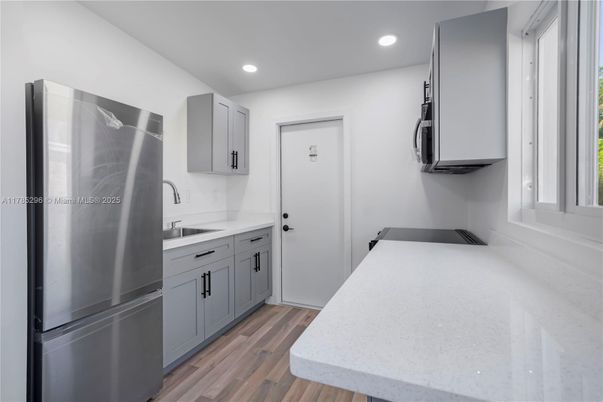 Interior, Kitchen, Recessed Lighting, Stainless Steel Appliances, Wood Texture Flooring