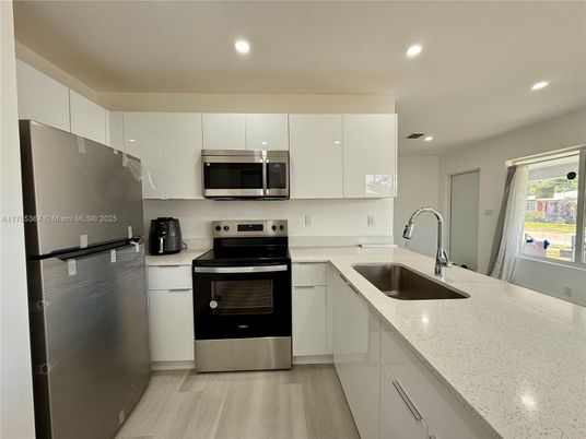 Interior, Kitchen, Recessed Lighting, Stainless Steel Appliances, Wood Texture Flooring