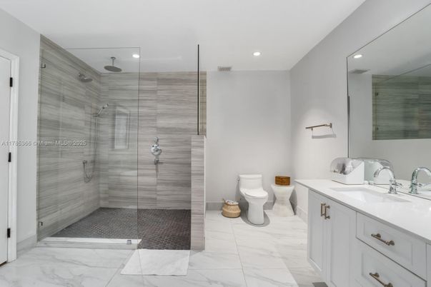 Bathroom, Dual Sink Vanities, Glass Shower, Interior, Marble, Recessed Lighting