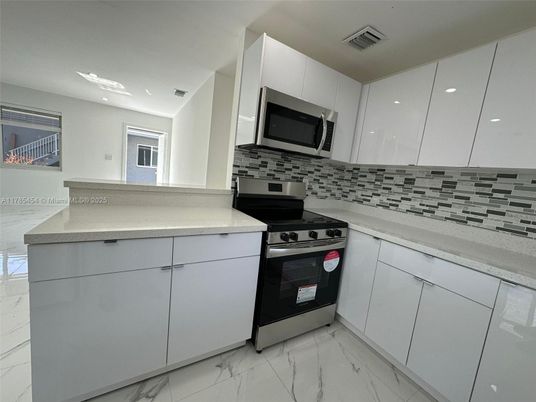 Interior, Kitchen, Marble, Recessed Lighting, Stainless Steel Appliances