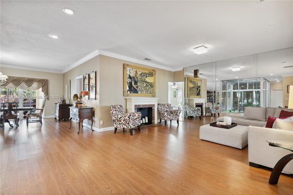 Dining room, Fireplace, Interior, Living room, Recessed Lighting, Wood Texture Flooring