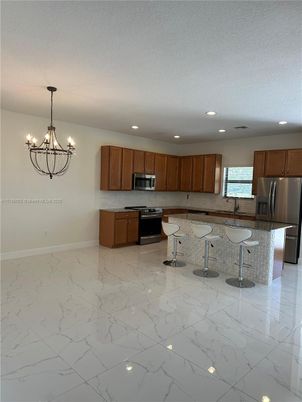 Chandelier, Interior, Kitchen, Marble, Recessed Lighting, Stainless Steel Appliances