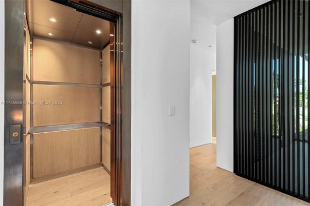 Elevator, Interior, Recessed Lighting, Wooden Ceilings, Wood Texture Flooring, Wooden Walls