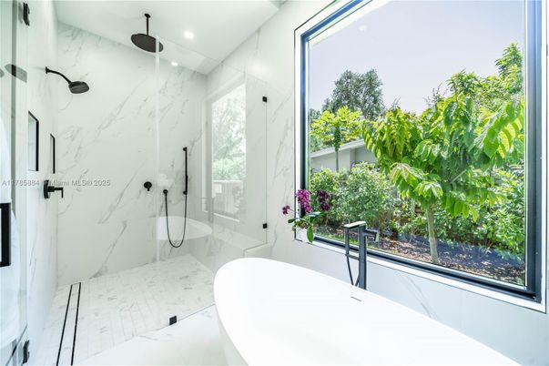Bathroom, Free Standing Baths, Glass Shower, Interior, Marble, Marble Walls, Recessed Lighting