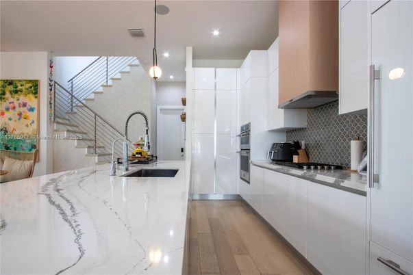 Interior, Kitchen, Pendant Lights, Recessed Lighting, Stainless Steel Appliances, Wood Texture Flooring