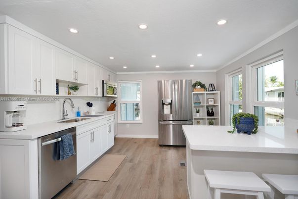 Interior, Kitchen, Recessed Lighting, Stainless Steel Appliances, Wood Texture Flooring