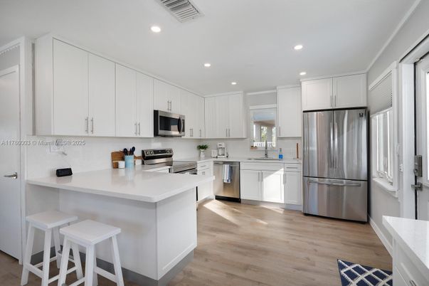 Interior, Kitchen, Recessed Lighting, Stainless Steel Appliances, Wood Texture Flooring