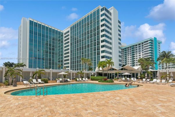 Exterior, Facade, Pool, Condo Building