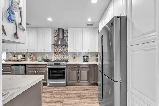 Interior, Kitchen, Recessed Lighting, Stainless Steel Appliances, Wood Texture Flooring