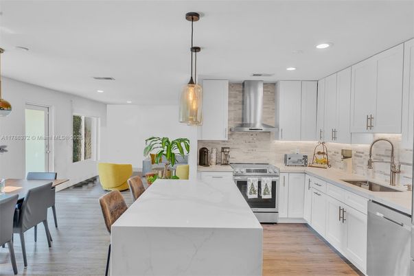 Interior, Kitchen, Pendant Lights, Recessed Lighting, Stainless Steel Appliances, Wood Texture Flooring