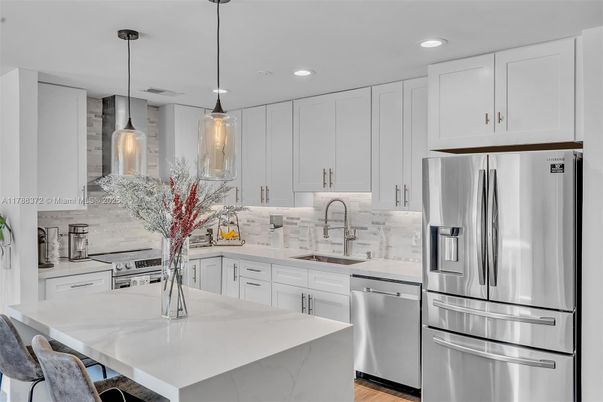 Interior, Kitchen, Pendant Lights, Recessed Lighting, Stainless Steel Appliances, Wood Texture Flooring