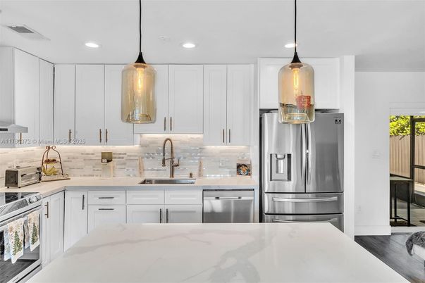 Interior, Kitchen, Pendant Lights, Recessed Lighting, Stainless Steel Appliances, Wood Texture Flooring
