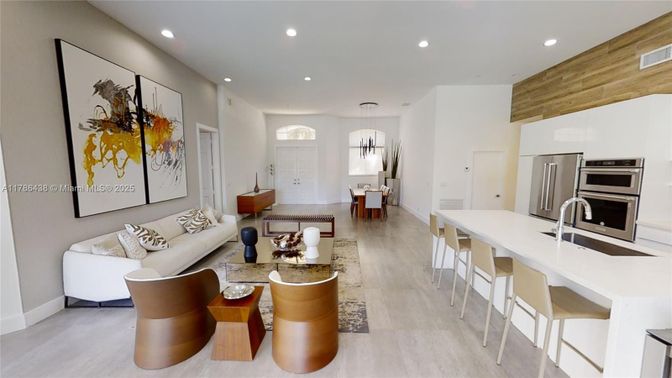Dining room, Interior, Kitchen, Living room, Pendant Lights, Recessed Lighting, Stainless Steel Appliances, Wood Texture Flooring