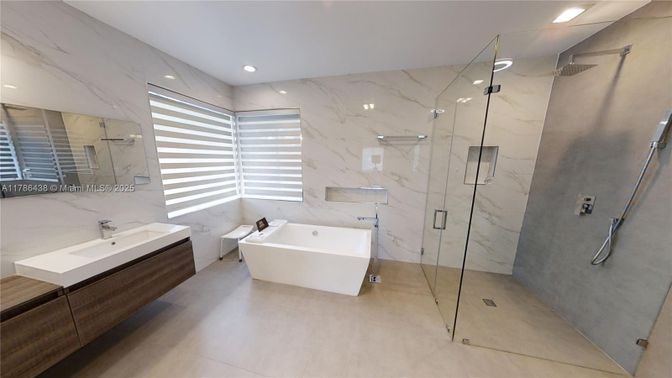 Bathroom, Free Standing Baths, Glass Shower, Interior, Marble Walls, Recessed Lighting