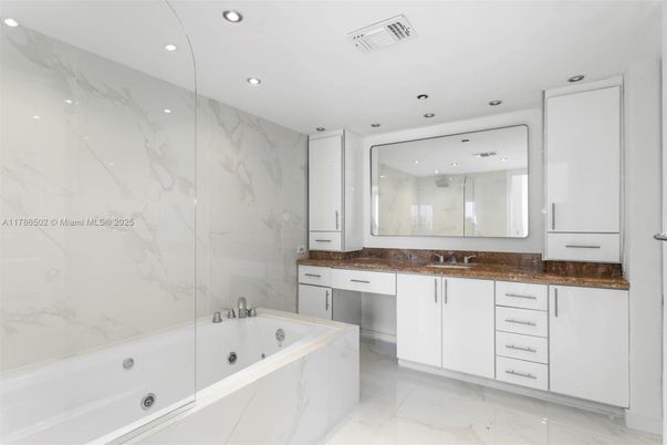 Bathroom, Dual Sink Vanities, Glass Shower, Interior, Marble, Marble Walls, Recessed Lighting