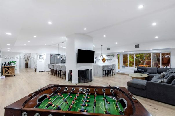 Billiard Table, Dining room, Game Room, Interior, Living room, Pendant Lights, Recessed Lighting, Wood Texture Flooring