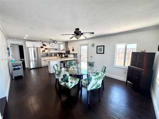Dining room, Interior, Kitchen, Recessed Lighting, Stainless Steel Appliances, Wood Texture Flooring