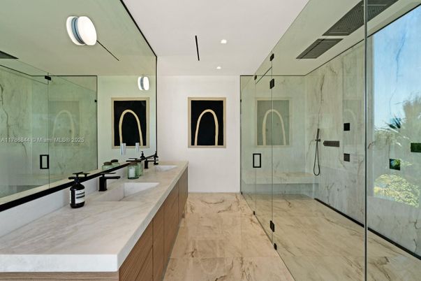 Bathroom, Dual Sink Vanities, Glass Shower, Interior, Marble, Marble Walls, Recessed Lighting