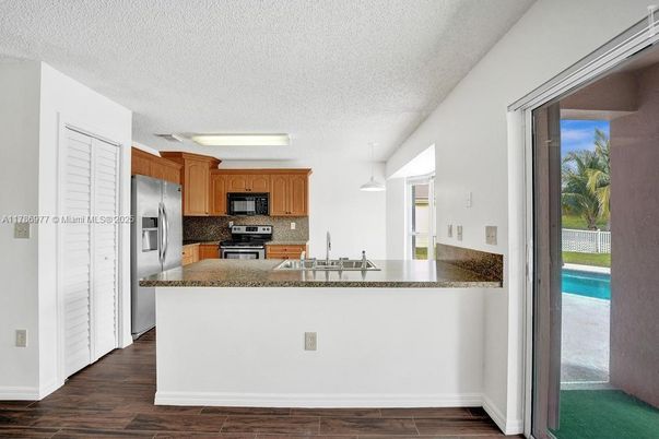 Interior, Kitchen, Pendant Lights, Stainless Steel Appliances, Wood Texture Flooring